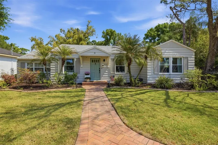 Charming home with huge back yard and studio apartment over 2 car garage.