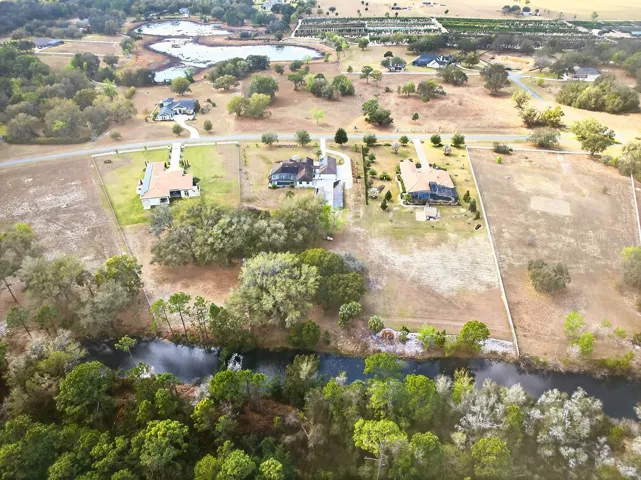 Perfectly situated within a gated, equestrian community.