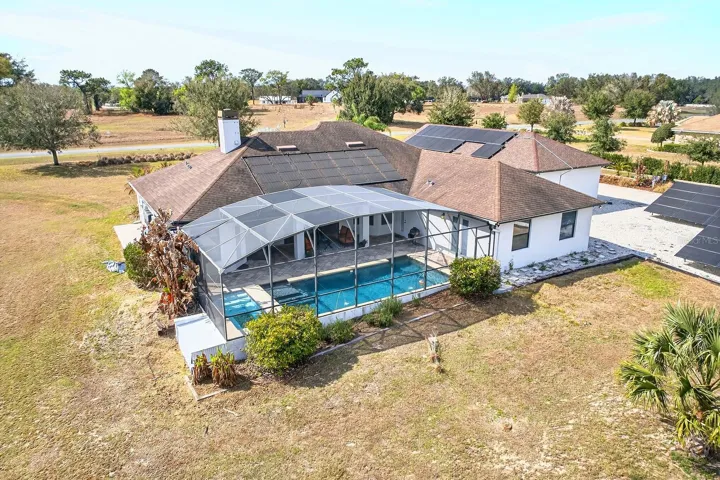 Outside, the sprawling property provides beautiful open views, privacy, and room to breathe, all within the sought-after Beauclair Ranch Club, a gated equestrian community known for its spacious homesites and serene setting.