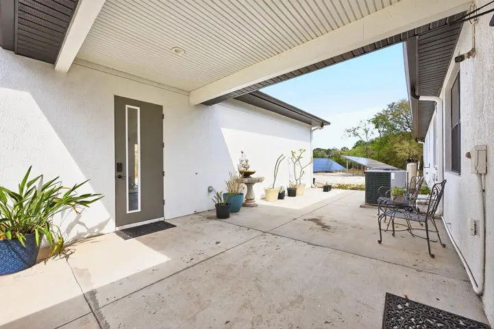 Covered walkway to the garage.