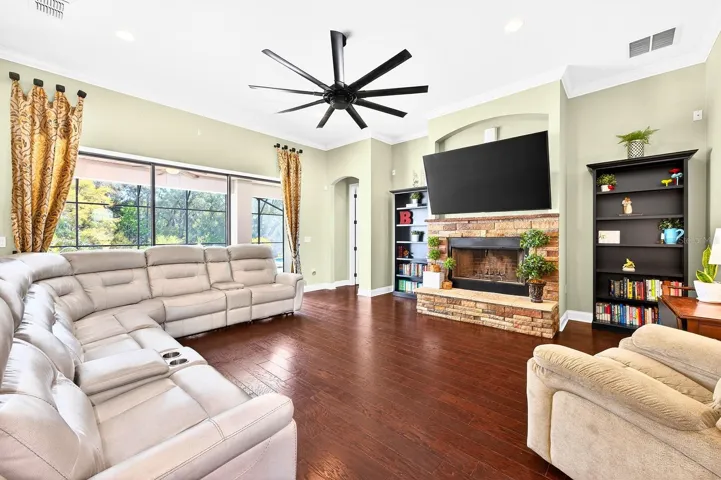 Inside, elevated design details are found everywhere you turn, including CROWN MOLDING throughout, ENGINEERED HARDWOOD flooring in the main living areas, and a light, bright OPEN CONCEPT layout designed for both everyday living and entertaining.