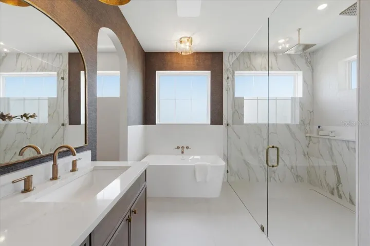 Primary Bathroom with archway into your closet
