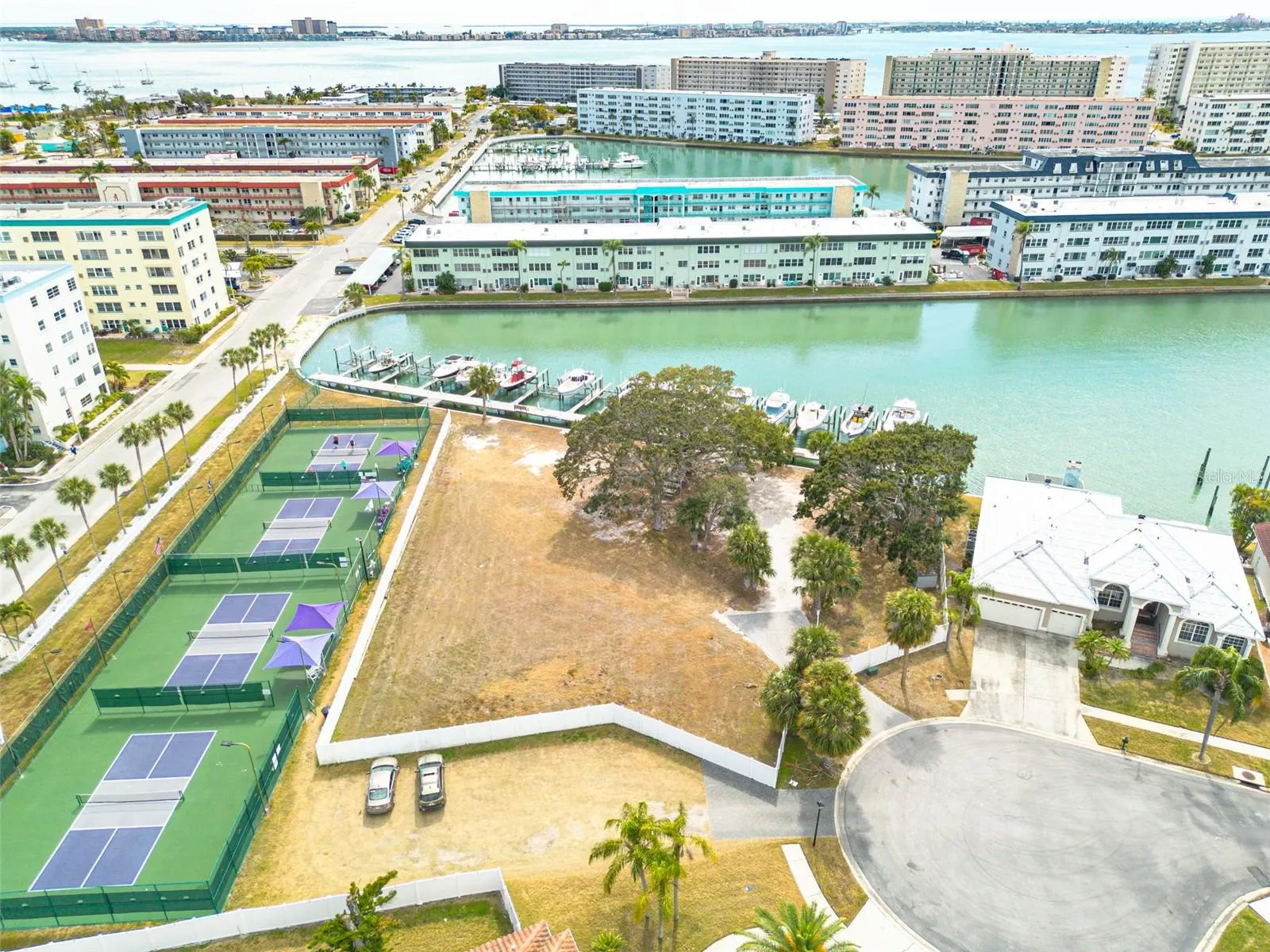 Access by boat or at the end of a cul-de sac with coded entry gate.