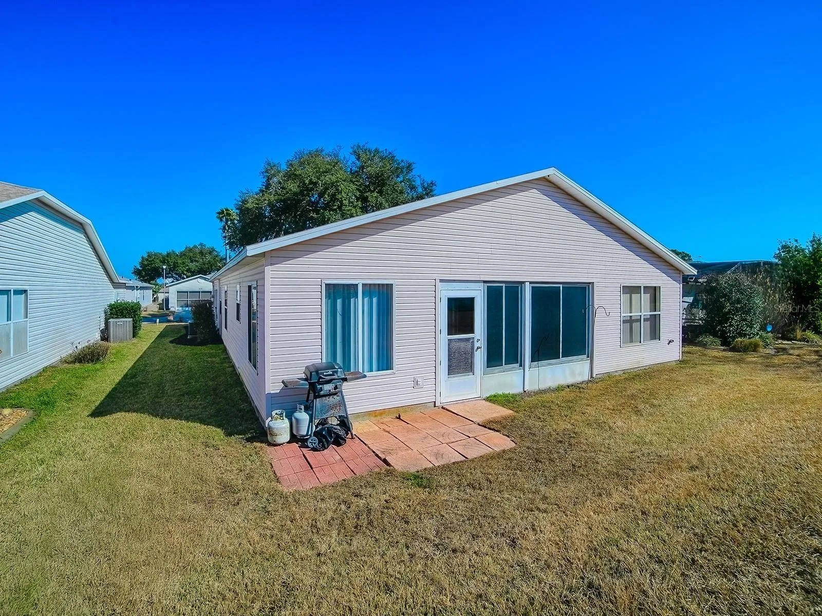 YOUR BACK YARD WITH PAD FOR GRILL