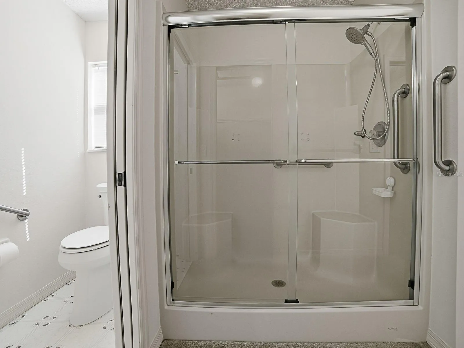 STEP IN SHOWER ND SEPARATE WATER CLOSET