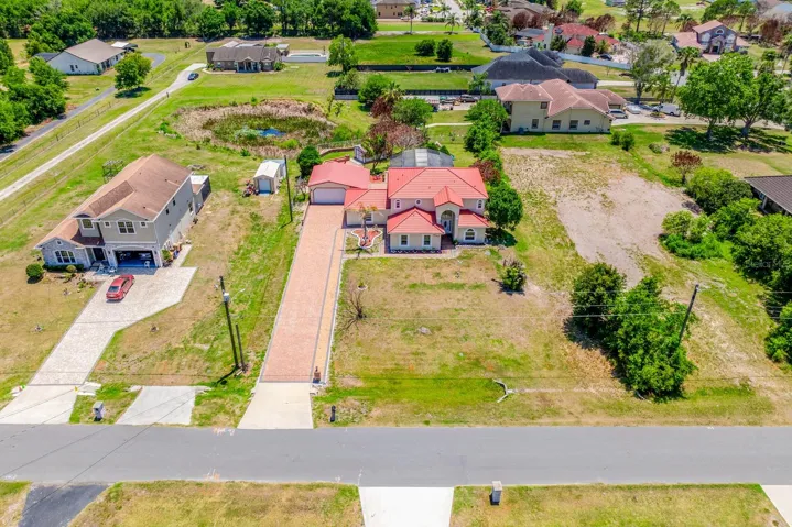 Perfectly situated just off Simpson Road, you will enjoy easy access to the Florida Turnpike, shopping, dining, area lakes, attractions, and world-famous theme parks – all while coming home to a quiet, established neighborhood with no HOA restrictions!