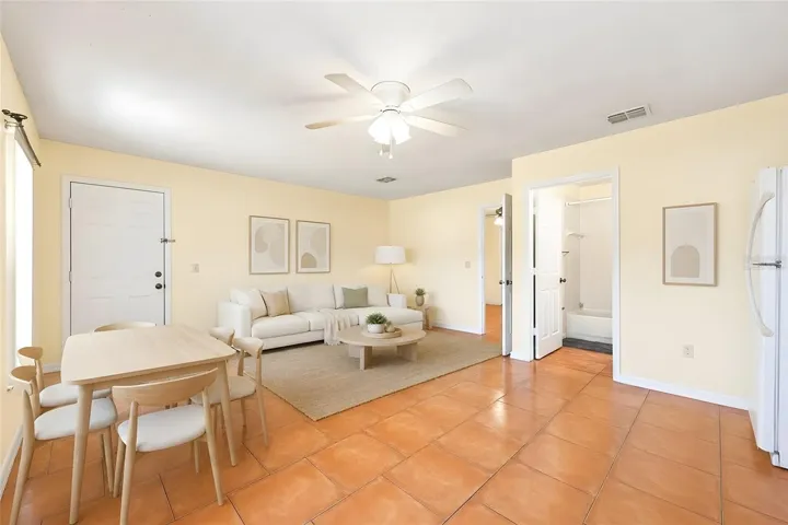 In-law suite/apartment - open living and kitchen. Virtually Staged.