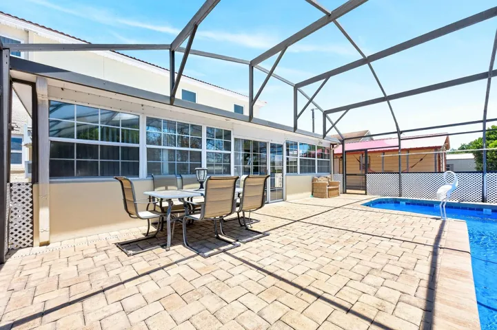 Plenty of room to relax or dine poolside.