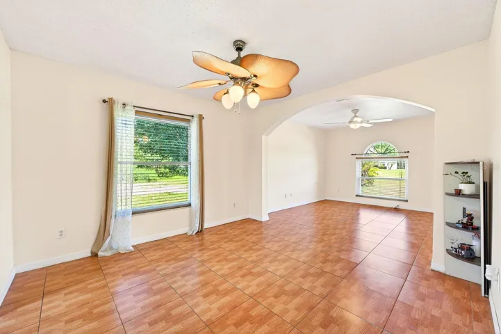 Flexible formal living and dining spaces at the front of the home.