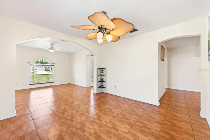 Flexible formal living and dining spaces at the front of the home.