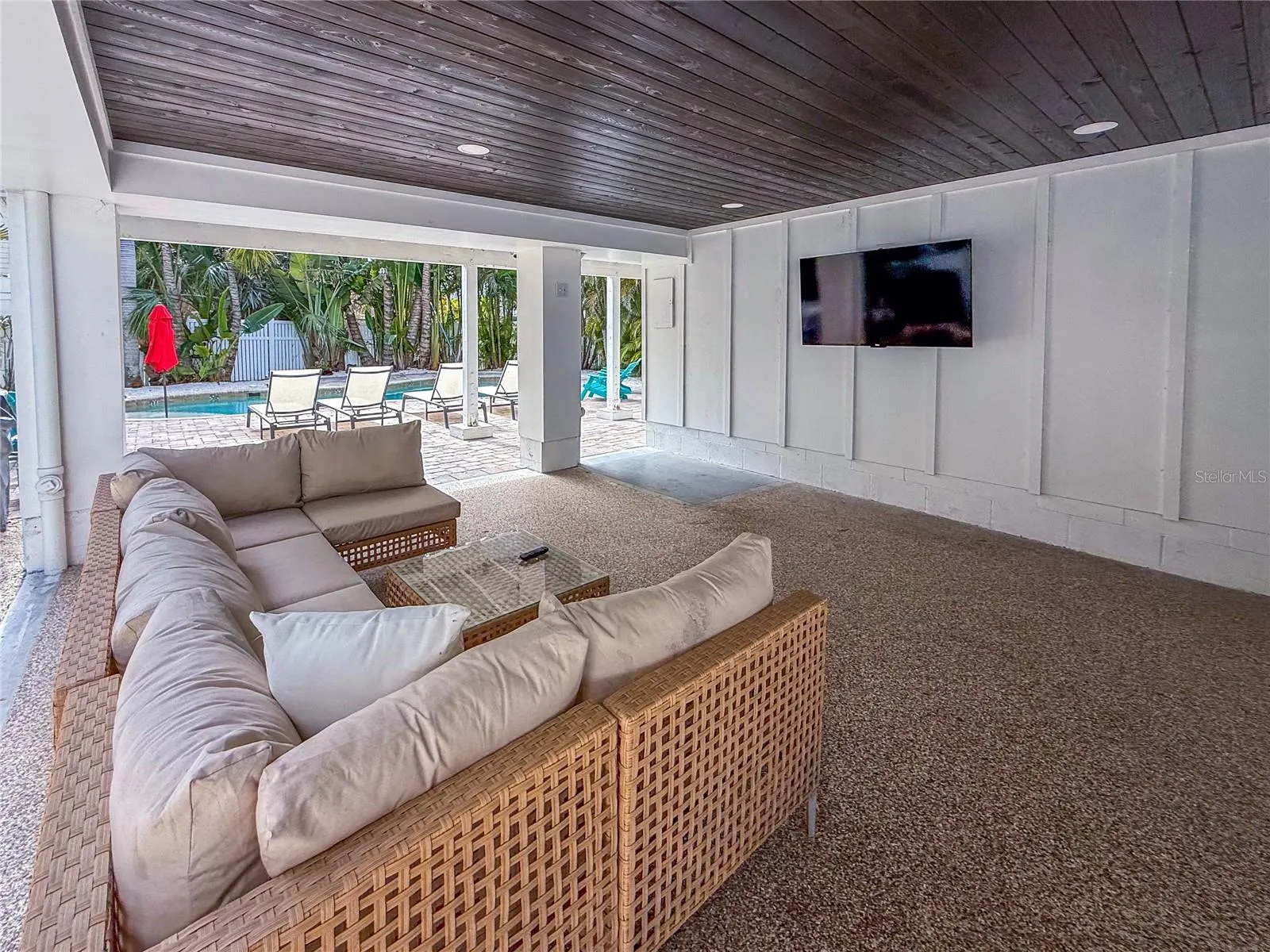 Covered outdoor TV &amp; entertainment area