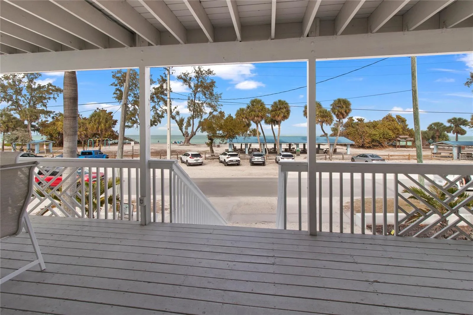 1st Floor Front Porch with view of Bay Park