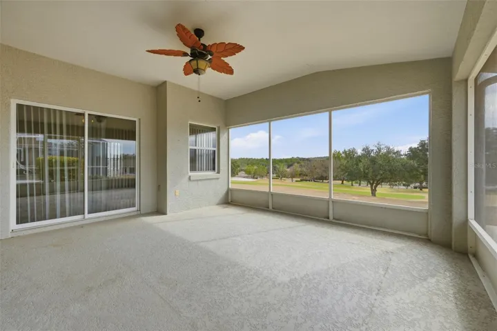 Lanai with sliders from primary bedroom