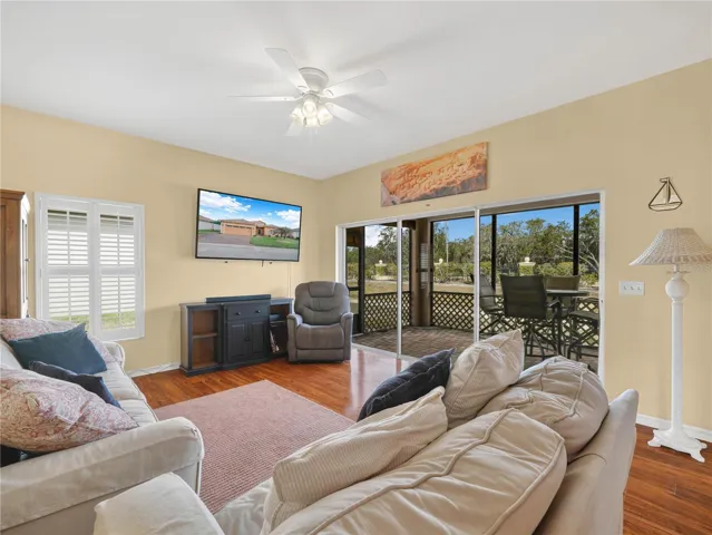 Living Room with triple sliders to Lanai