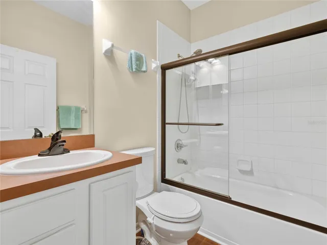 Guest Bath with Shower Tub Combo and Glass Enclosure