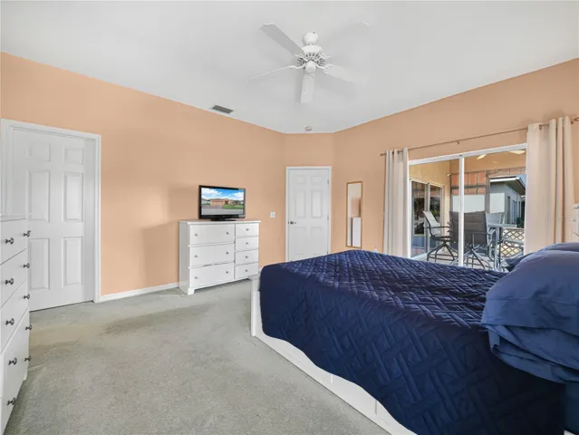 Primary Bedroom with Glass Sliders to Lanai