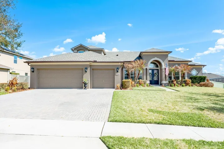 Welcome to an extraordinary showpiece in the highly sought-after Wekiva Run community of Apopka—a GATED enclave known for its peaceful setting and upscale homes.