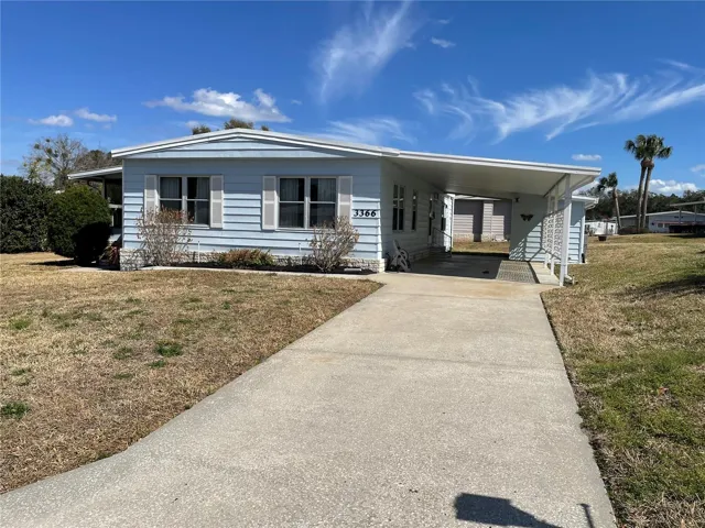 View of front exterior looking east
