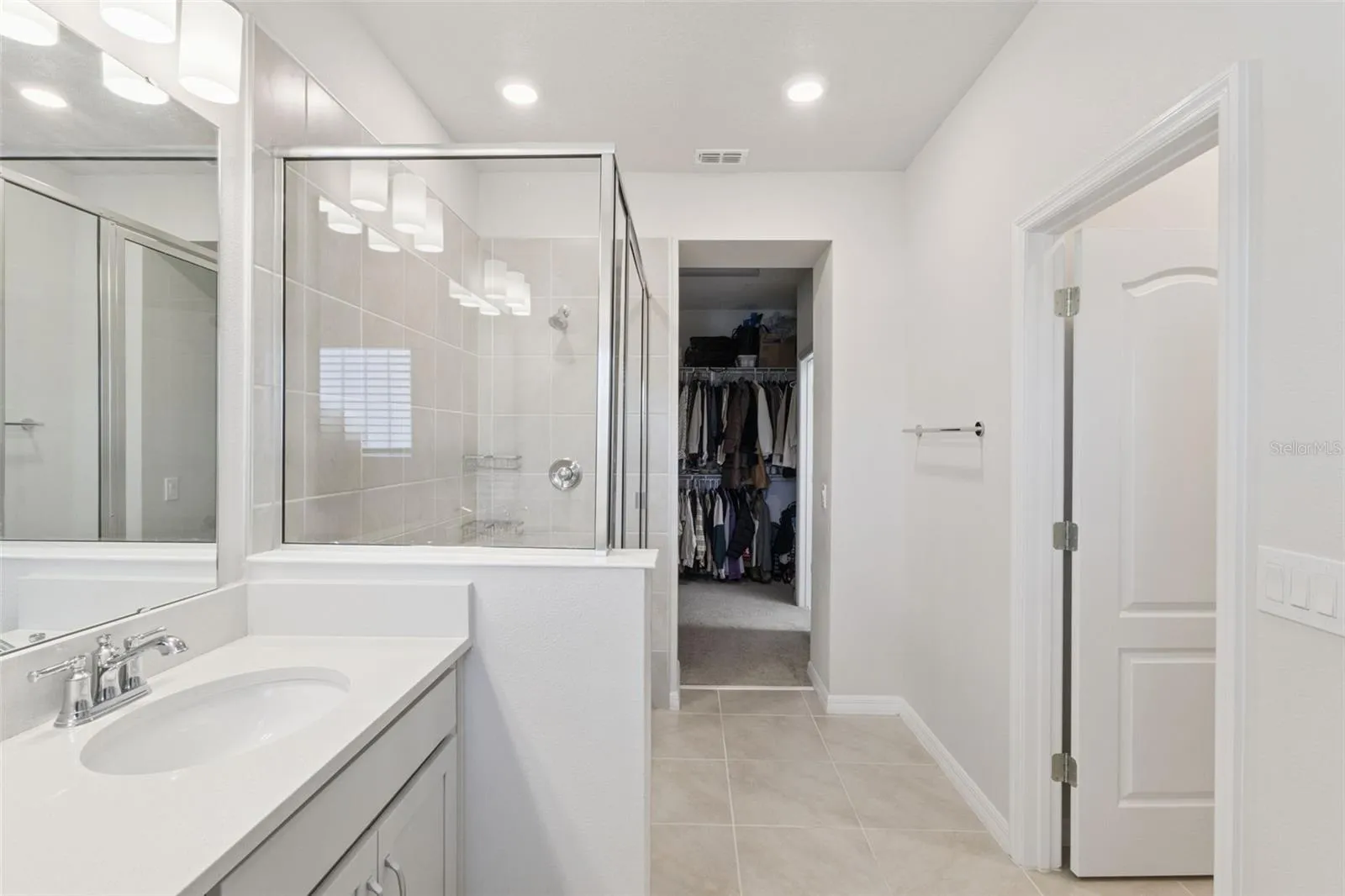 Primary bathroom with walk in c