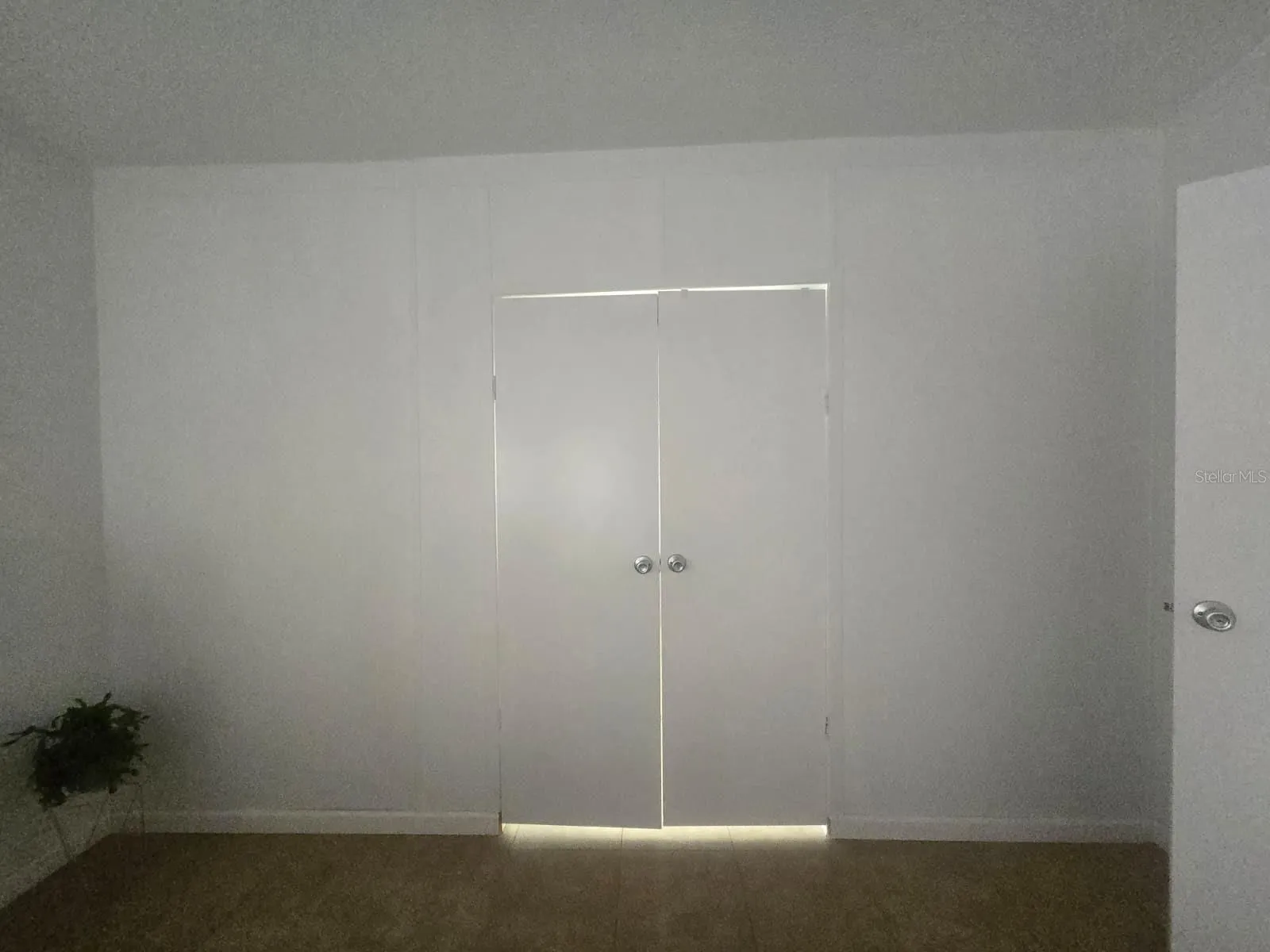 Master Bedroom double doors towards master bathroom