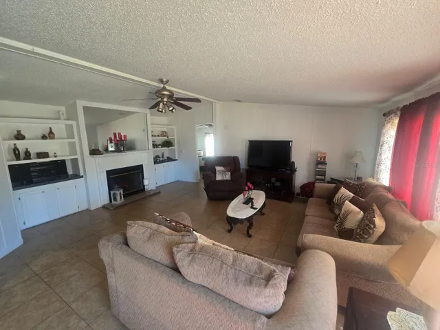 Living Room, to the right side is the master bedroom