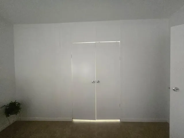 Master Bedroom double doors towards master bathroom