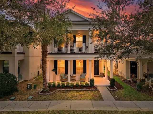 Charming covered front porch with timeless curb appeal.