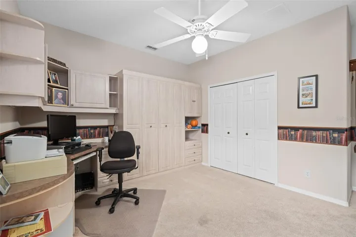 Bedroom 3 offers a Murphy Bed with a Desk