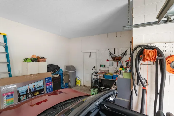 Workshop or Storage area in the garage. There is also a 220 V Receptacle for EV Charging