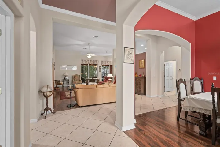 Foyer with a view of the Dining and Great Rooms with 11' Ceilings