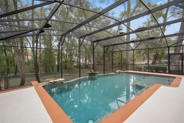 The Pool Depth is approximately 3' to 7'. There is also a propane Fire Feature for Night Time Ambiance.
