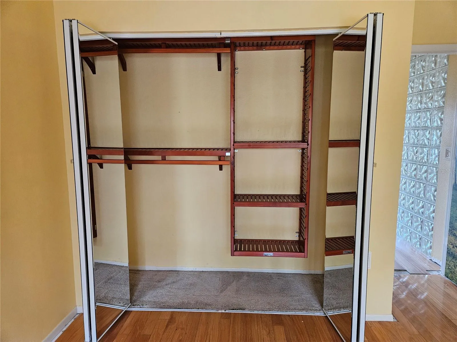 3rd BR with custom wood closet organizer