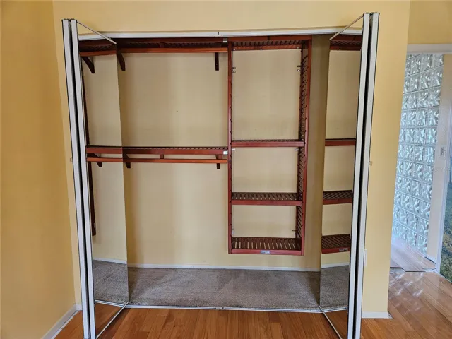 3rd BR with custom wood closet organizer