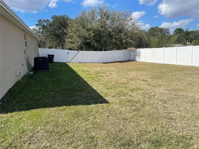 Fenced Side Yard A/C UNIT