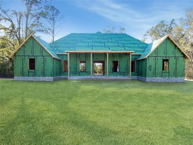 Landscaping digitally enhanced. Actual property condition may differ.