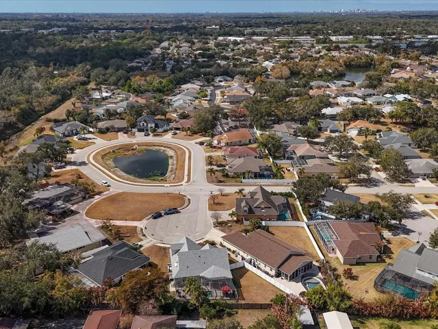 Aerial of Cul-de-sac with Pond in center