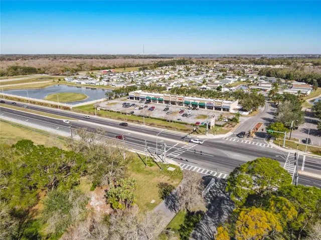 Aerial View Shopping Center Across the Street