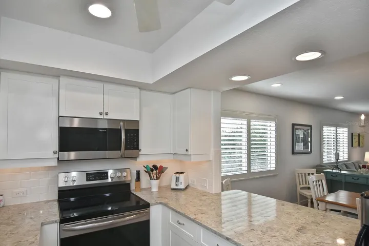 Kitchen with pass through to dining area