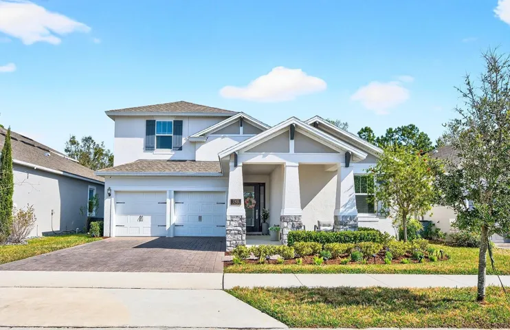 BUILT IN 2023 and meticulously maintained, this stunning Dream Finders ~ Anna Maria model with the bonus, 5th and 6th bedroom option offers one of the largest and most versatile floor plans in the sought after Rivington community of DeBary!
