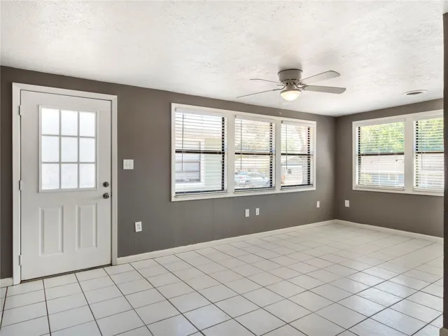 Light and bright with access to the back patio, perfect for grilling out and enjoying the FL Sunshine