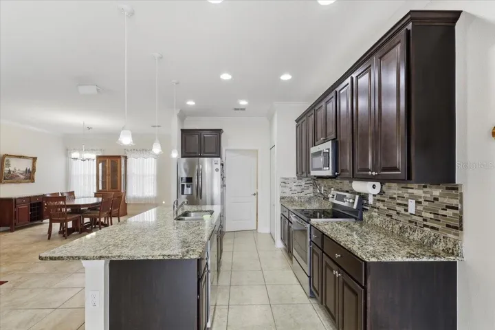 kitchen to laundry room to garage
