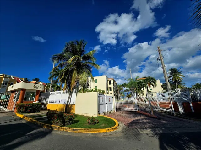 The right hand side gate is the entrance to Poza del Mar