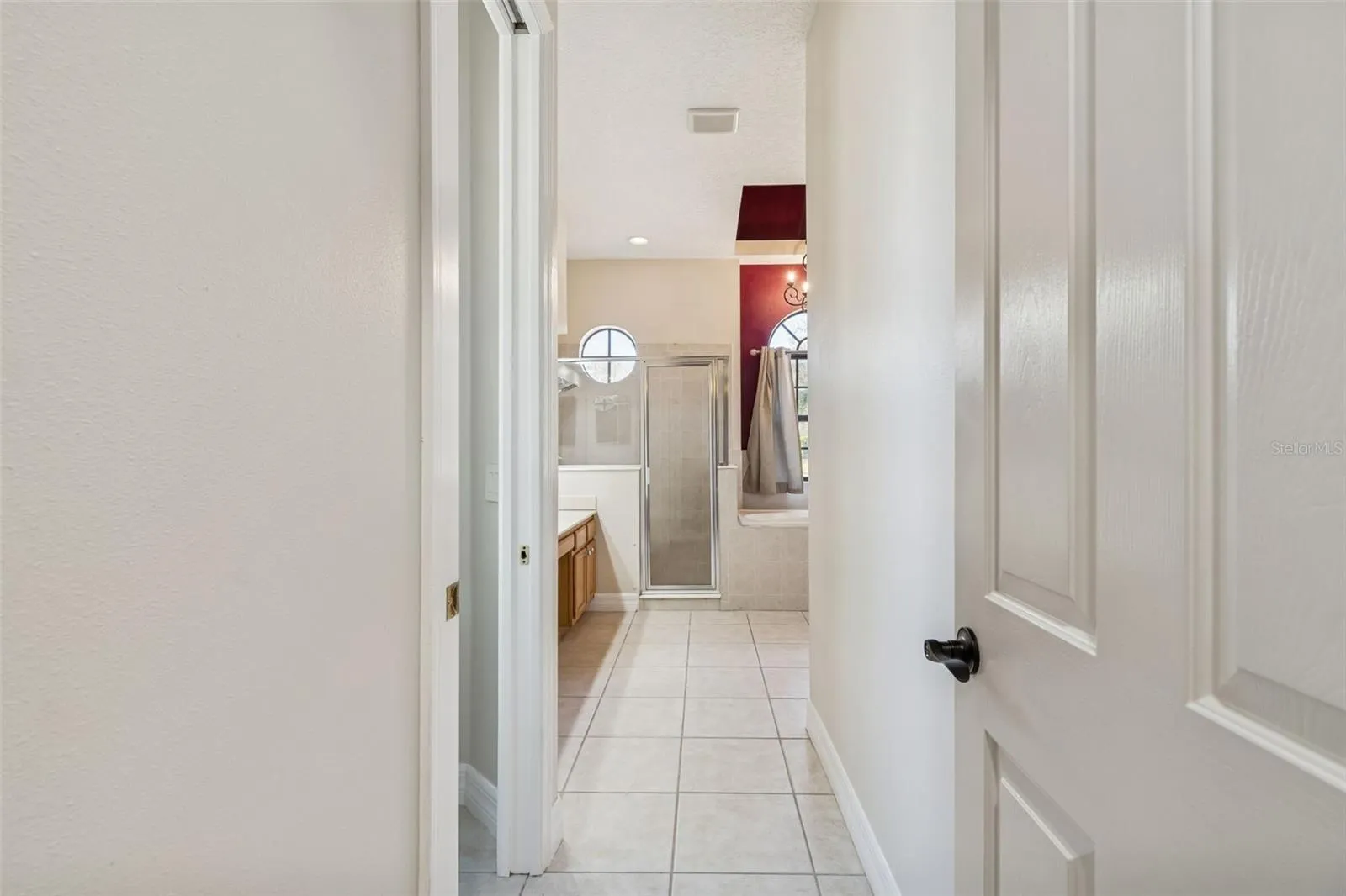 Hallway to primary bath