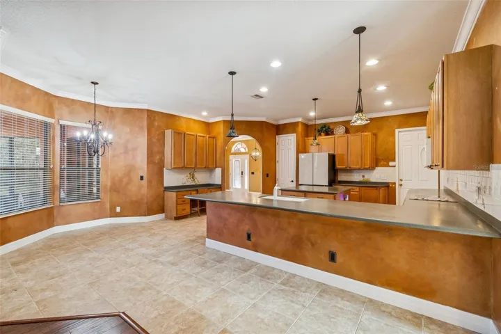 Dinette to left of kitchen