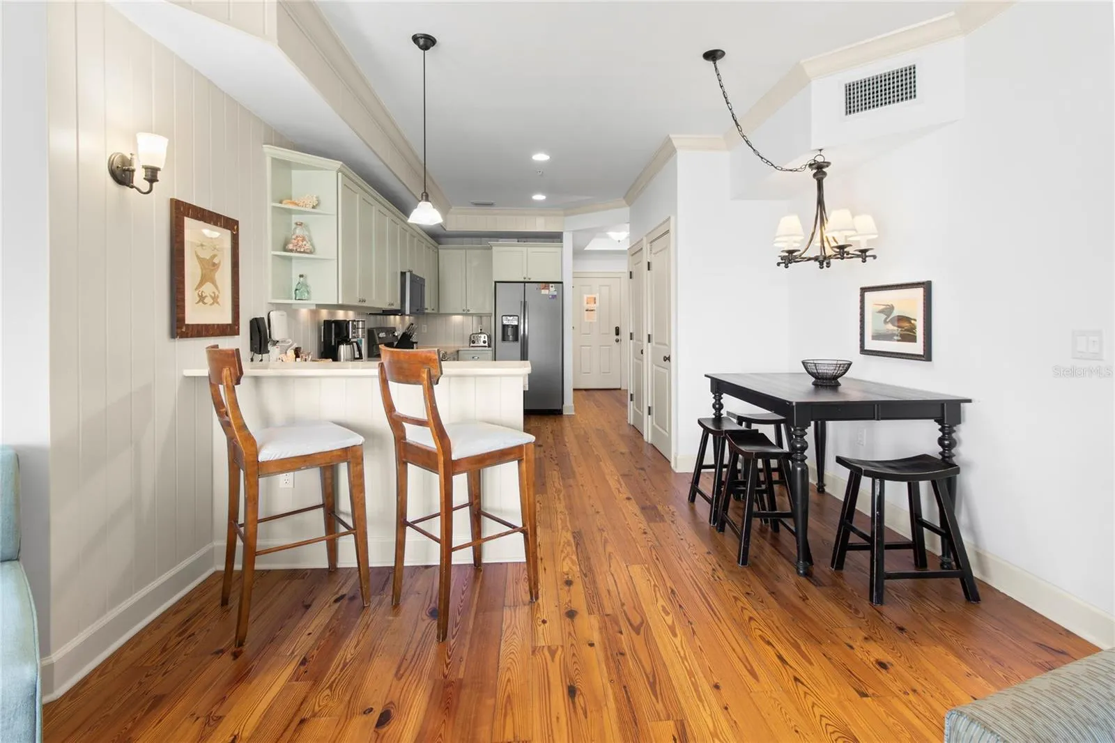 KITCHEN BREAKFAST BAR AND EATING AREA