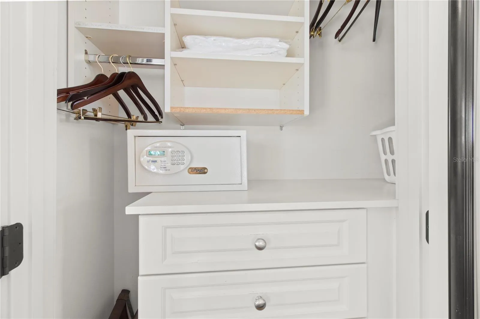 PRIMARY BEDROOM BUILT-IN CLOSET AND SAFE