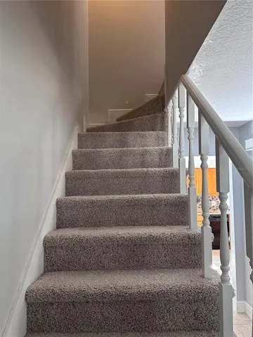 Stairs leading to second floor