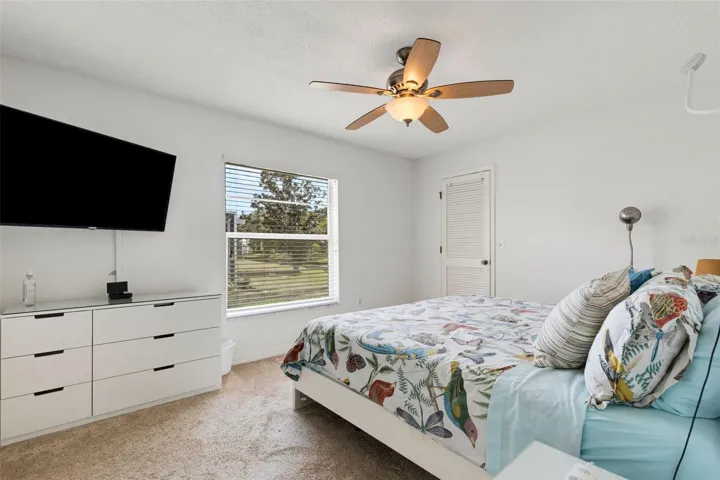 2nd bedroom behind family room - furniture ad TV included