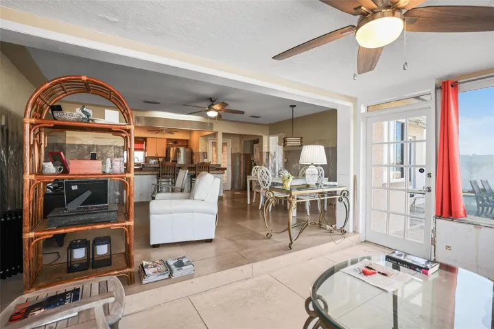 VIEW TO LIVING, DINING AND KITCHEN