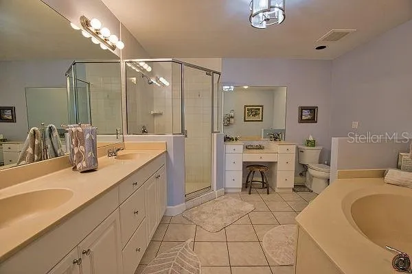 Master bath with separate shower-garden tub